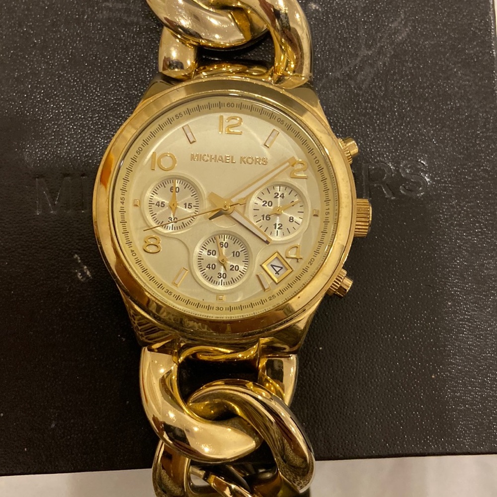 Gold like new Michael Kors link watch